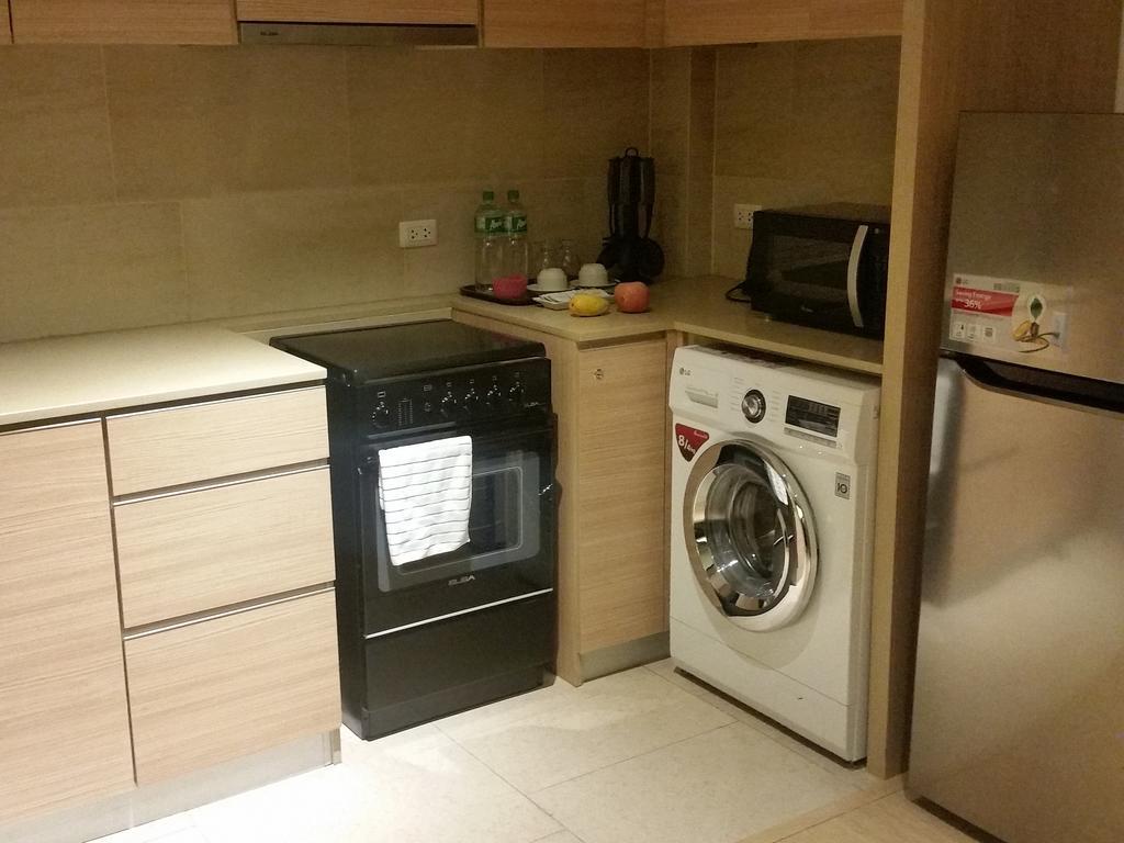 Shang Luxury Suites Mandaluyong Номер фото