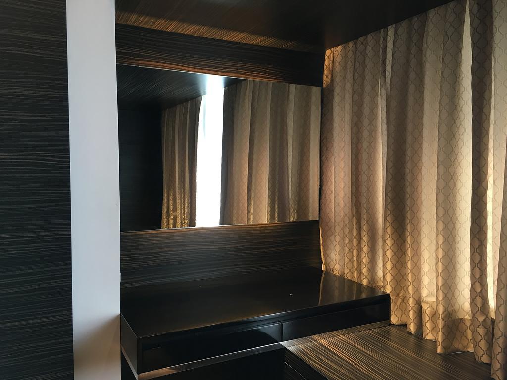 Shang Luxury Suites Mandaluyong Номер фото