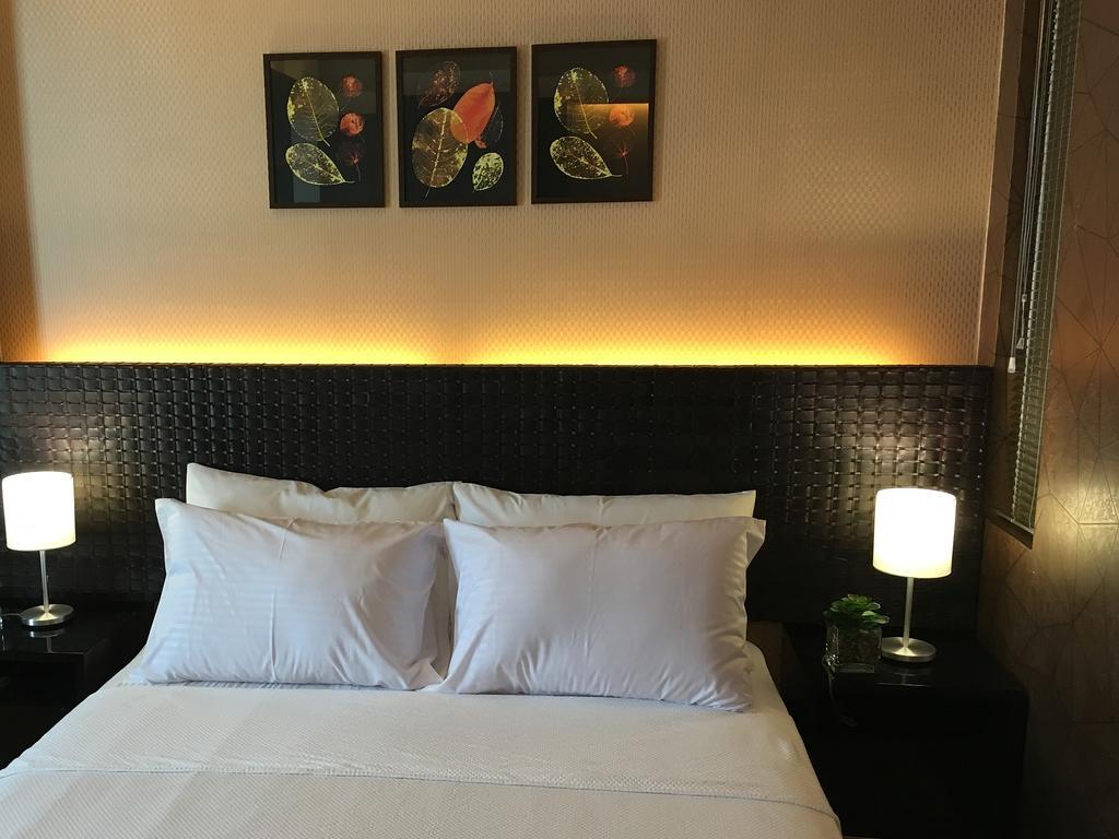 Shang Luxury Suites Mandaluyong Номер фото