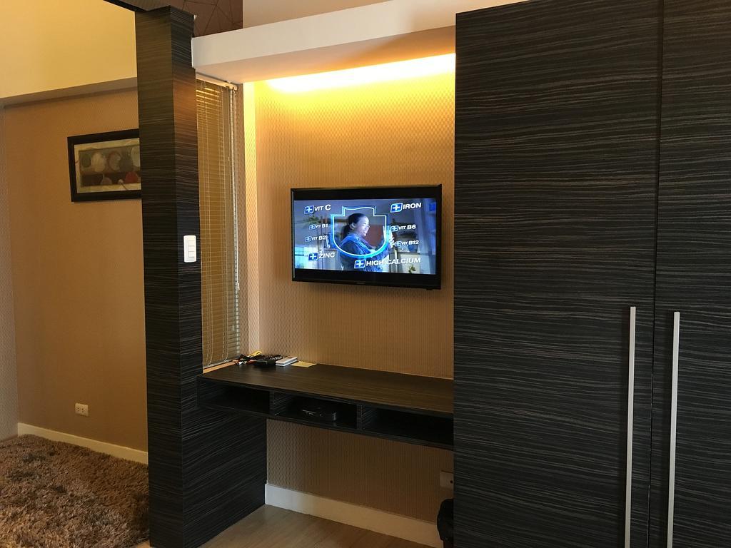 Shang Luxury Suites Mandaluyong Номер фото