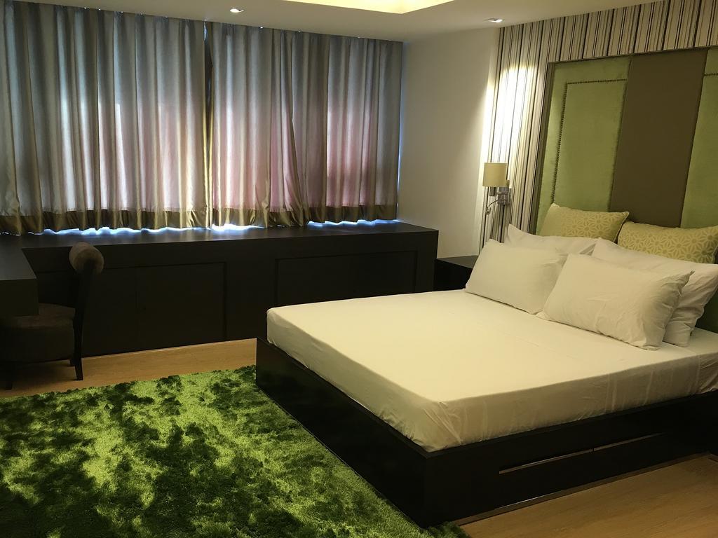 Shang Luxury Suites Mandaluyong Номер фото
