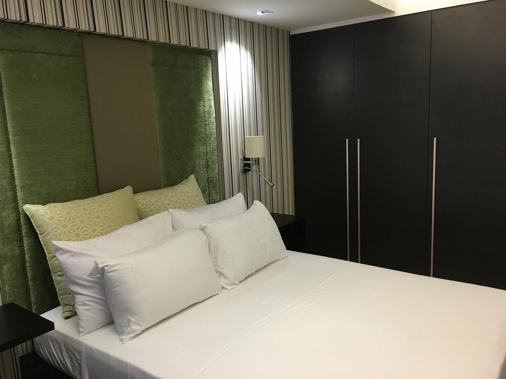 Shang Luxury Suites Mandaluyong Номер фото