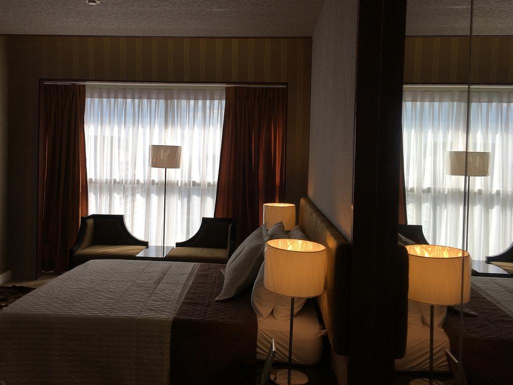 Shang Luxury Suites Mandaluyong Номер фото